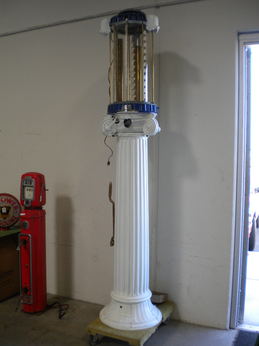 Wayne Roman column 10-gallon visible gas pump, complete, with all original pieces, $12,650. Matthews Auctions image.